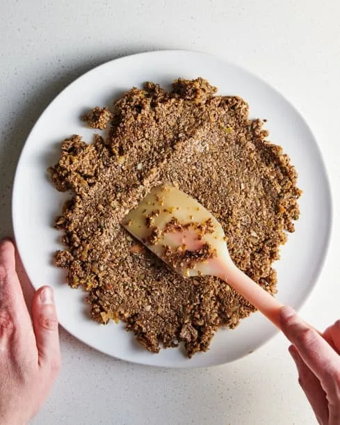 Spread the mushroom mixture out on a large plate in an even layer. Refrigerate until chilled, about 30 minutes to 1 hour.