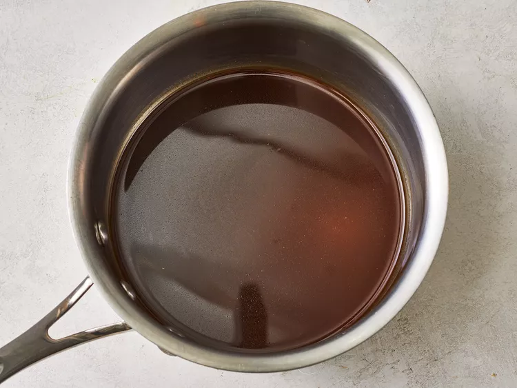 In a small saucepan over medium heat, combine 1 cup of water, soy sauce, brown sugar, honey, ground ginger, and garlic powder. Stir everything together and cook for about 1 minute until the mixture is almost heated through.