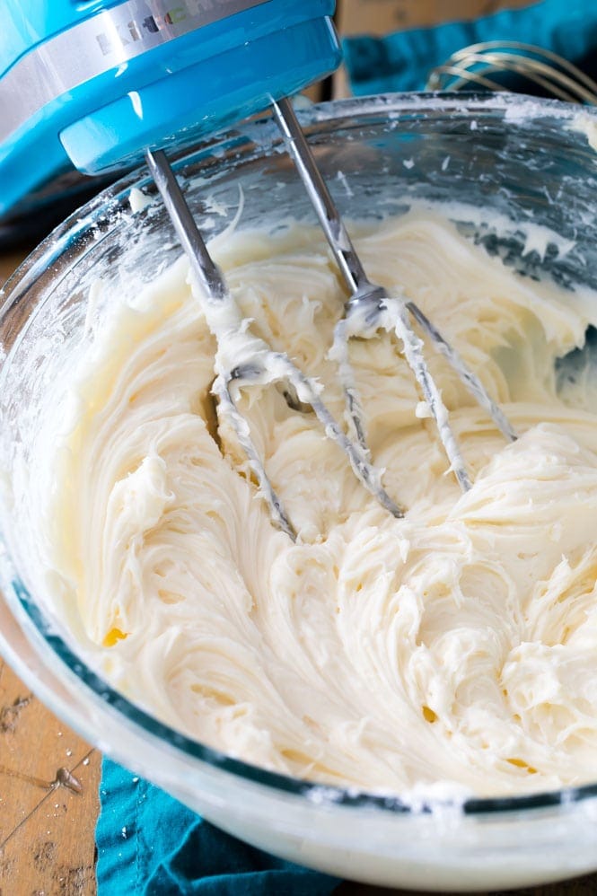 In a large mixing bowl, combine the softened butter and cream cheese. Beat with a stand mixer or electric mixer until the mixture is smooth, creamy, and free of lumps.