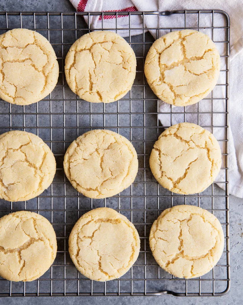 Let the cookies cool on the baking sheet briefly before transferring them to a rack to cool completely.