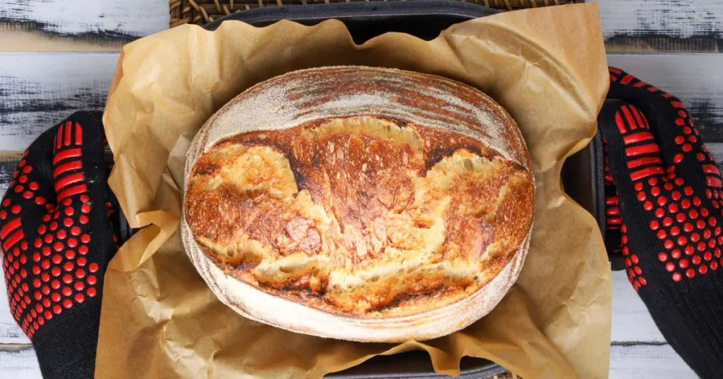Remove the bread from the Dutch oven immediately and let it cool completely on a wire rack before slicing.