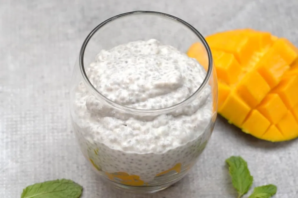 Finish with additional mango and optional granola on top, then serve immediately for the best texture and flavor.