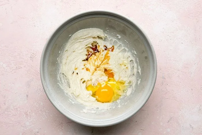 Add the egg and vanilla extract, mixing on low speed just until fully combined and smooth.
