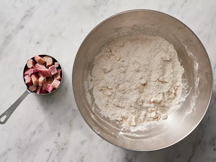 Whisk together the flour, sugar, baking powder, salt, cinnamon, and nutmeg in a large bowl until evenly combined.
